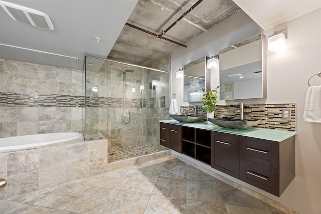 2000 Bagby St Unit 7414, Houston, TX 77002 - full bath with double vanity, a shower stall, a garden tub, and decorative backsplash