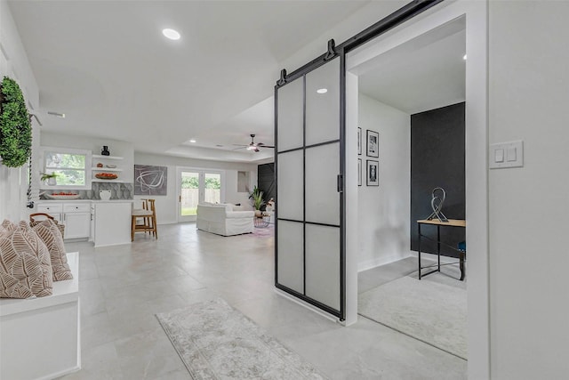 5226 Sanford Rd, Houston, TX 77035 - corridor with recessed lighting and a barn door