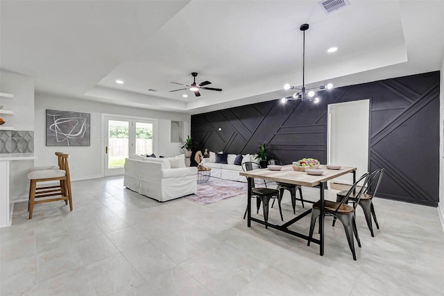 5226 Sanford Rd, Houston, TX 77035 - living room featuring a raised ceiling, ceiling fan, a decorative wall, and recessed lighting