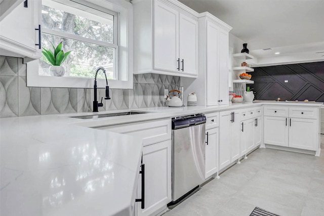 5226 Sanford Rd, Houston, TX 77035 - kitchen featuring stainless steel dishwasher, backsplash, white cabinetry, and open shelves