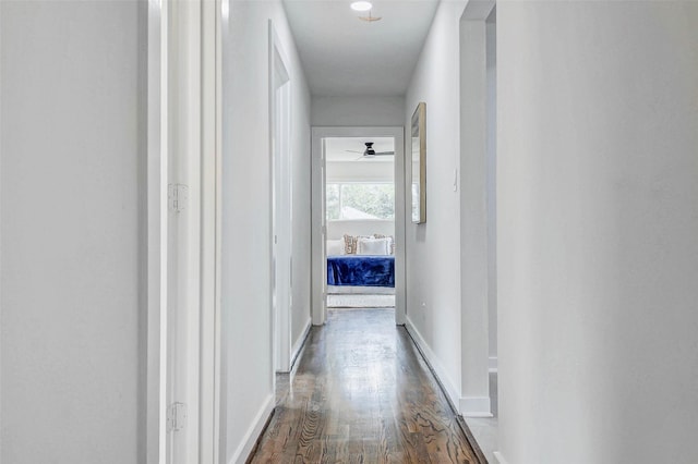 5226 Sanford Rd, Houston, TX 77035 - hallway featuring dark wood-style flooring and baseboards