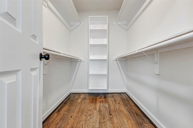 5226 Sanford Rd, Houston, TX 77035 - walk in closet with dark wood finished floors