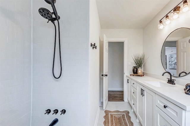 5226 Sanford Rd, Houston, TX 77035 - full bath featuring vanity, tiled shower, and tile patterned flooring