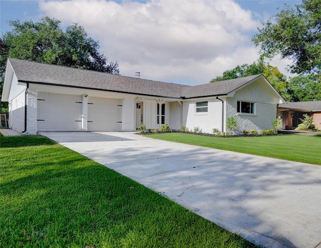 5226 Sanford Rd, Houston, TX 77035 - ranch-style home featuring brick siding, concrete driveway, a garage, and a front yard