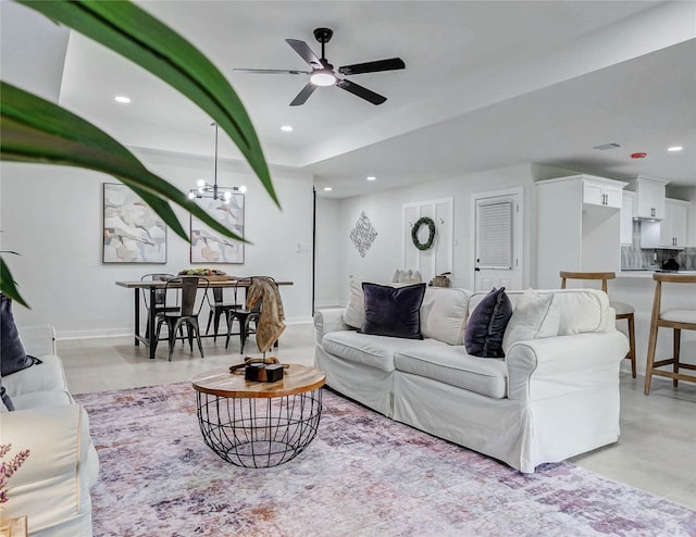 5226 Sanford Rd, Houston, TX 77035 - living room featuring a ceiling fan, recessed lighting, and a chandelier
