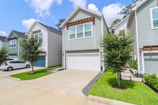 5213 Pinemont Creek Ln, Houston, TX 77018 - view of front of property with board and batten siding, driveway, and an attached garage
