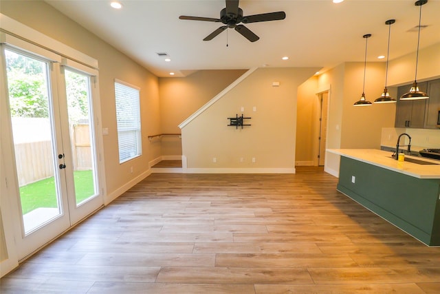 5213 Pinemont Creek Ln, Houston, TX 77018 - unfurnished living room with light wood finished floors, recessed lighting, and a ceiling fan