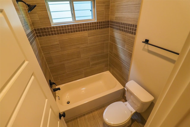 5213 Pinemont Creek Ln, Houston, TX 77018 - bathroom featuring toilet and bathing tub / shower combination