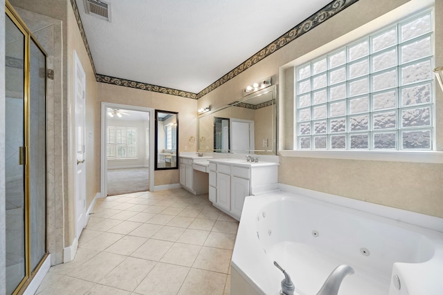 16426 Torry View Ter, Houston, TX 77095 - bathroom with a shower stall, vanity, a tub with jets, tile patterned floors, and ceiling fan