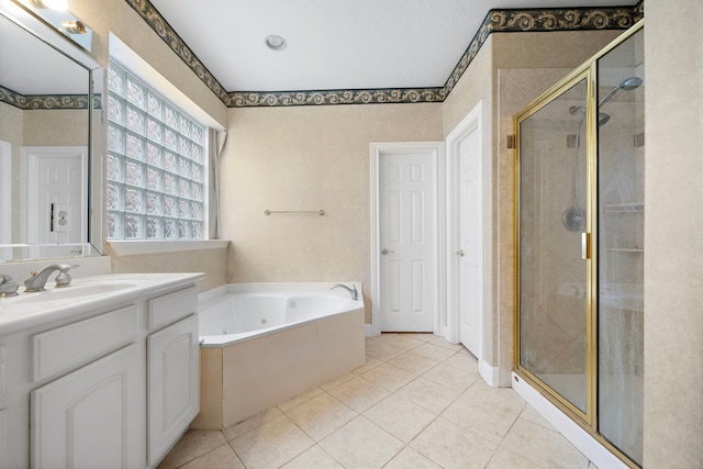 16426 Torry View Ter, Houston, TX 77095 - bathroom featuring a jetted tub, vanity, a shower stall, and tile patterned flooring