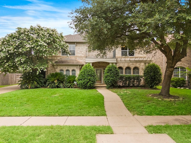 16426 Torry View Ter, Houston, TX 77095 - view of front facade featuring a balcony and brick siding