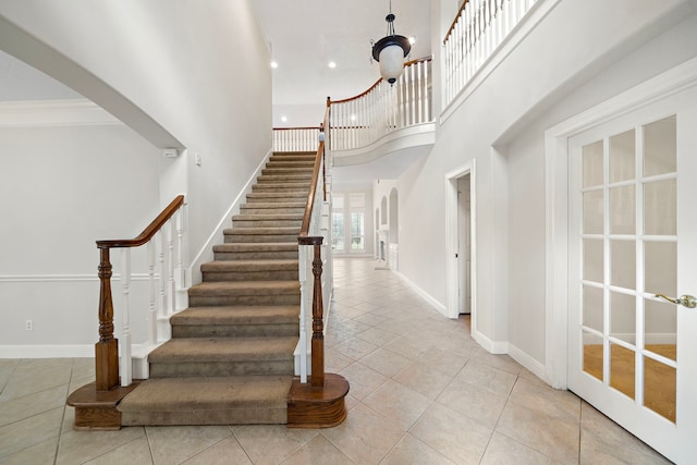 16426 Torry View Ter, Houston, TX 77095 - stairs with tile patterned flooring, a towering ceiling, recessed lighting, and ornamental molding