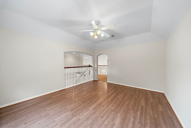16426 Torry View Ter, Houston, TX 77095 - spare room with a ceiling fan, wood finished floors, and arched walkways