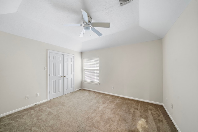 16426 Torry View Ter, Houston, TX 77095 - unfurnished bedroom with carpet floors, a closet, vaulted ceiling, and a ceiling fan