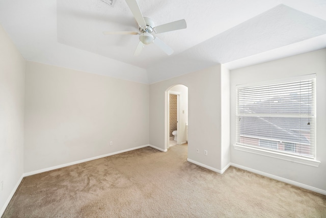 16426 Torry View Ter, Houston, TX 77095 - spare room with light colored carpet, arched walkways, and ceiling fan