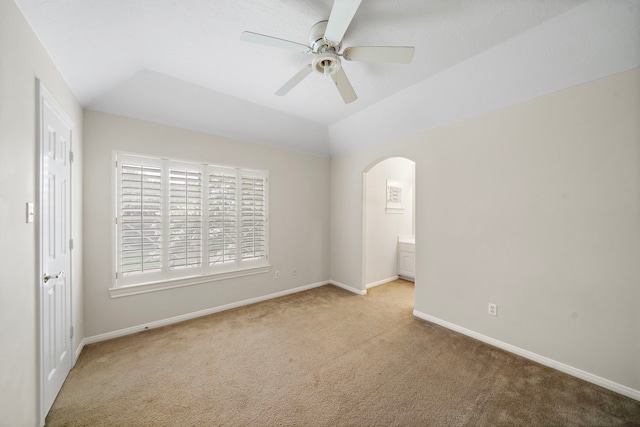 16426 Torry View Ter, Houston, TX 77095 - carpeted spare room featuring lofted ceiling, a ceiling fan, and arched walkways