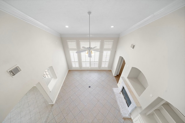 16426 Torry View Ter, Houston, TX 77095 - unfurnished living room featuring light tile patterned floors, a ceiling fan, a brick fireplace, crown molding, and recessed lighting