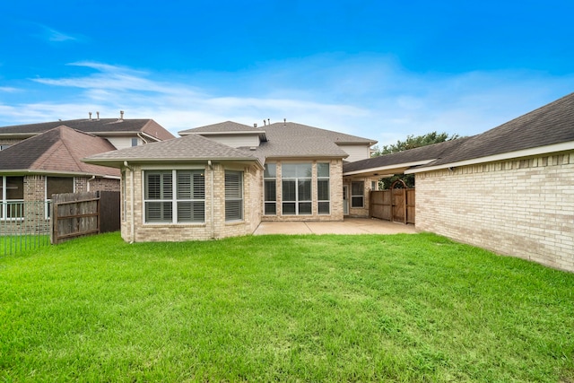 16426 Torry View Ter, Houston, TX 77095 - back of property with brick siding, a patio, and roof with shingles