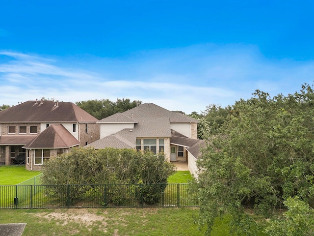 16426 Torry View Ter, Houston, TX 77095 - rear view of property with a fenced backyard, brick siding, and a shingled roof