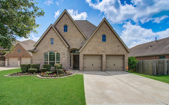 3605 Dolan Trail Ct, Pearland, TX 77584 - view of front of house featuring brick siding, concrete driveway, a garage, and roof with shingles
