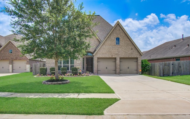 3605 Dolan Trail Ct, Pearland, TX 77584 - view of front of home with brick siding, driveway, an attached garage, and a shingled roof