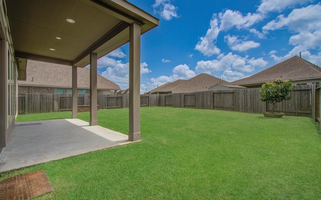3605 Dolan Trail Ct, Pearland, TX 77584 - fenced backyard featuring a patio