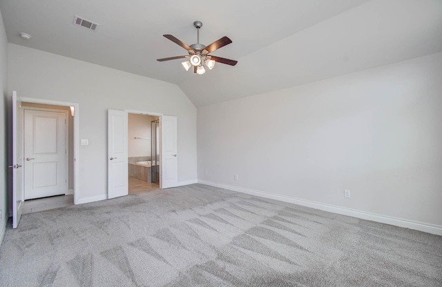 3605 Dolan Trail Ct, Pearland, TX 77584 - unfurnished bedroom with carpet floors, vaulted ceiling, ensuite bathroom, and a ceiling fan