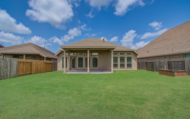 3605 Dolan Trail Ct, Pearland, TX 77584 - rear view of house with a fenced backyard, a patio area, and roof with shingles