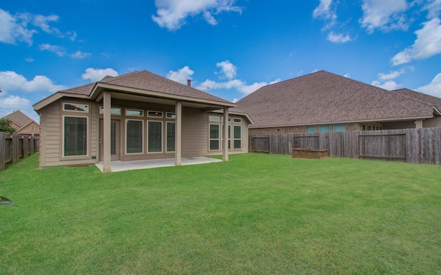3605 Dolan Trail Ct, Pearland, TX 77584 - rear view of house featuring a fenced backyard, a patio, and roof with shingles