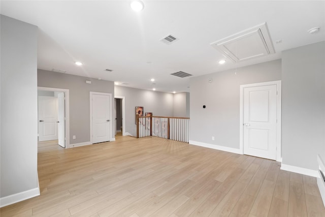 14315 Summer Prairie Trl, Cypress, TX 77433 - unfurnished room with attic access, light wood finished floors, a smoke detector, and recessed lighting