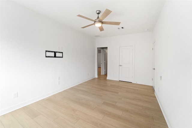 14315 Summer Prairie Trl, Cypress, TX 77433 - empty room featuring light wood-style floors and ceiling fan