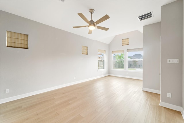 14315 Summer Prairie Trl, Cypress, TX 77433 - empty room featuring ceiling fan, light wood-style flooring, and high vaulted ceiling