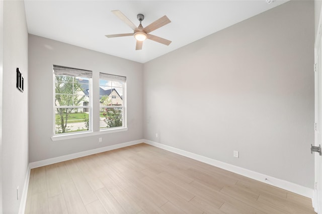 14315 Summer Prairie Trl, Cypress, TX 77433 - spare room featuring light wood-style flooring and a ceiling fan