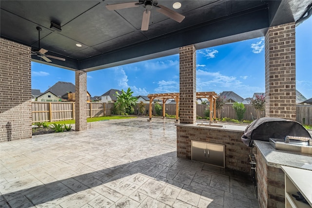 14315 Summer Prairie Trl, Cypress, TX 77433 - fenced backyard with a ceiling fan, exterior kitchen, a pergola, a residential view, and a patio
