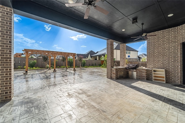 14315 Summer Prairie Trl, Cypress, TX 77433 - fenced backyard with area for grilling, a pergola, ceiling fan, and a patio area