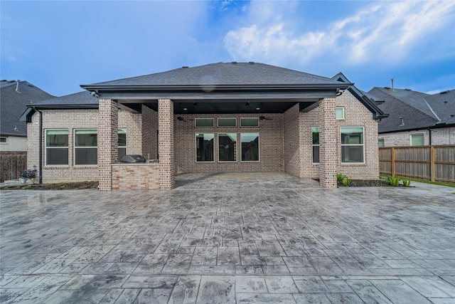 14315 Summer Prairie Trl, Cypress, TX 77433 - rear view of house with a patio area, brick siding, ceiling fan, and roof with shingles