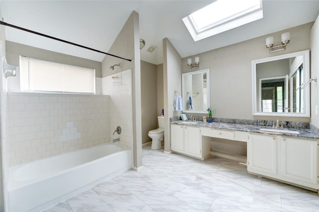 15403 Meadow Village Dr, Houston, TX 77095 - bathroom with a skylight, shower / tub combination, double vanity, marble finish flooring, and vaulted ceiling