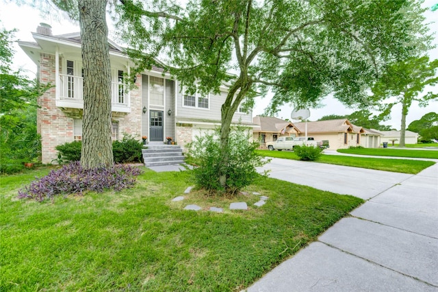 15403 Meadow Village Dr, Houston, TX 77095 - raised ranch with driveway, a front lawn, a chimney, and an attached garage
