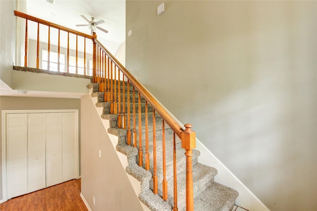 15403 Meadow Village Dr, Houston, TX 77095 - stairway with a towering ceiling, ceiling fan, and wood finished floors