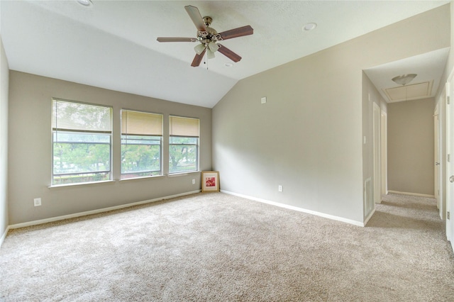 15403 Meadow Village Dr, Houston, TX 77095 - empty room with attic access, carpet, ceiling fan, and lofted ceiling
