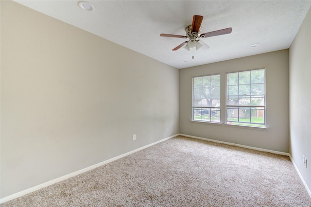 15403 Meadow Village Dr, Houston, TX 77095 - empty room featuring carpet and a ceiling fan