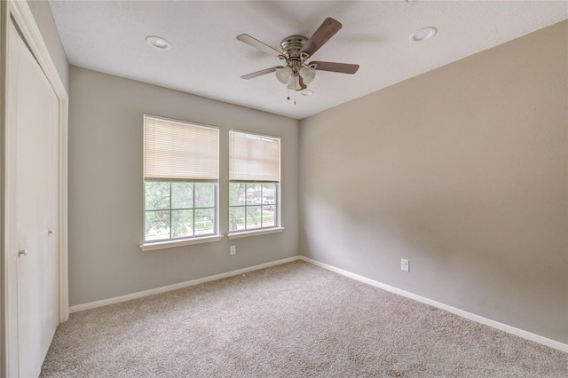 15403 Meadow Village Dr, Houston, TX 77095 - spare room featuring carpet floors, ceiling fan, and recessed lighting