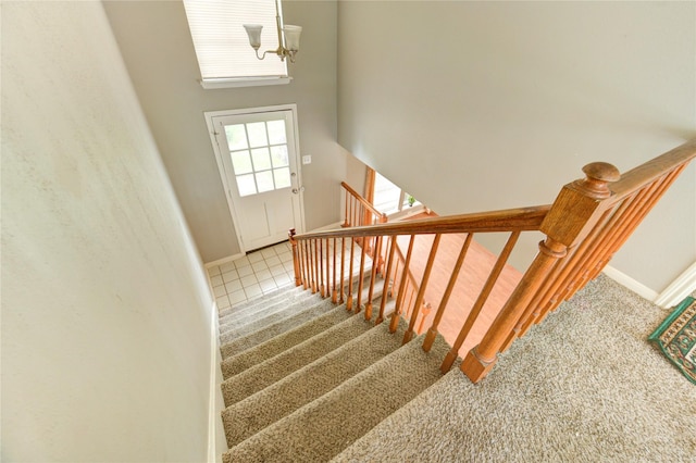15403 Meadow Village Dr, Houston, TX 77095 - stairs with carpet floors, a chandelier, and a high ceiling