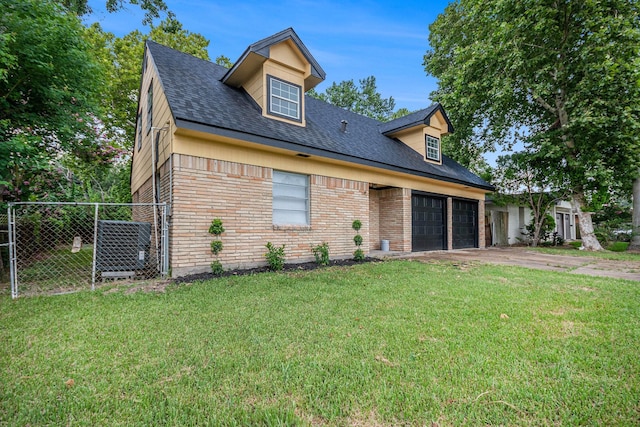 1605 30th St N, Texas City, TX 77590 - cape cod home with brick siding, an attached garage, roof with shingles, and concrete driveway