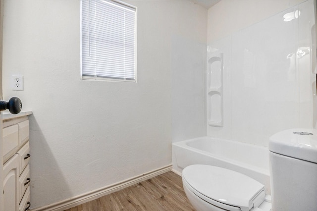 1605 30th St N, Texas City, TX 77590 - bathroom with vanity, wood finished floors, and  shower combination