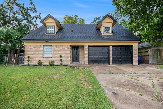 1605 30th St N, Texas City, TX 77590 - view of front of property with brick siding and a shingled roof