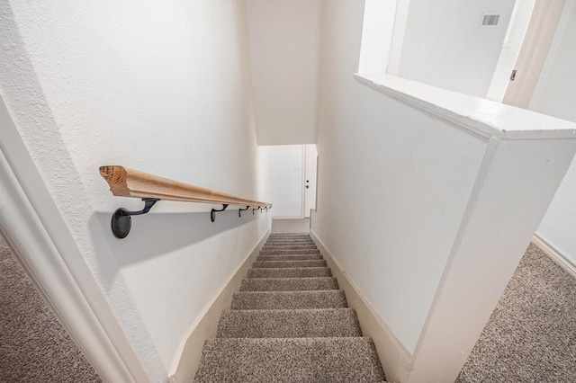 1605 30th St N, Texas City, TX 77590 - stairs featuring carpet and baseboards