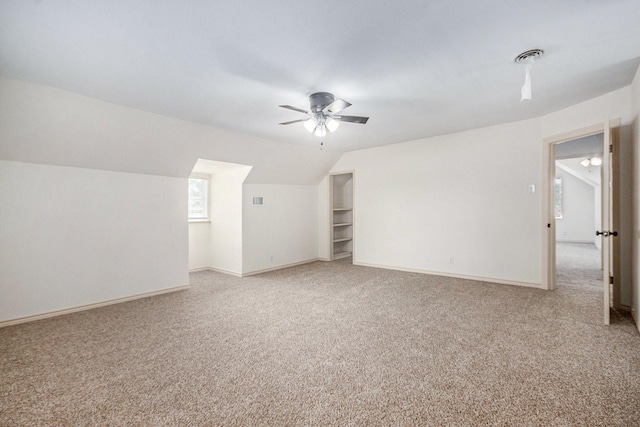 1605 30th St N, Texas City, TX 77590 - bonus room with light colored carpet, ceiling fan, and lofted ceiling