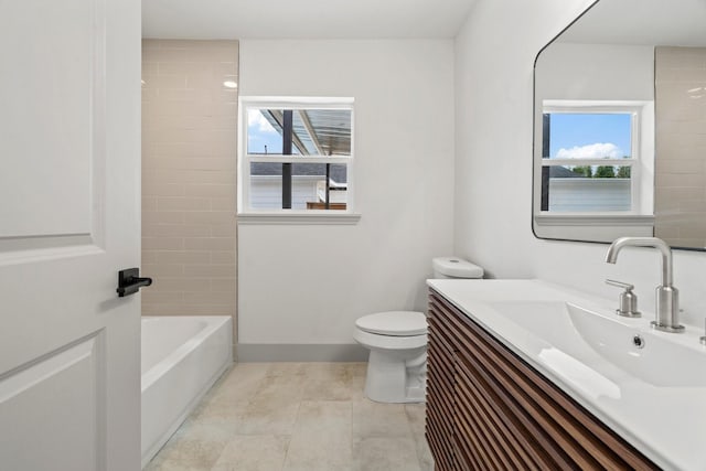 1009 Genova St, Houston, TX 77009 - bathroom featuring vanity, tile patterned floors, and tub / shower combination