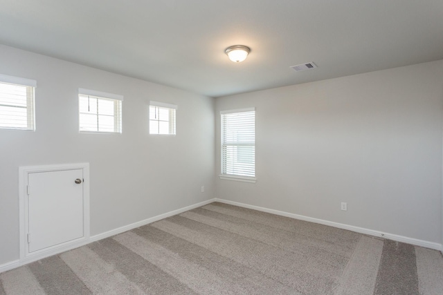 8506 Belfast Manor Ln, Richmond, TX 77407 - spare room featuring light colored carpet